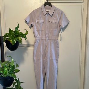 GOOD AMERICAN's Fit For Success denim jumpsuit features a structured, slim fit